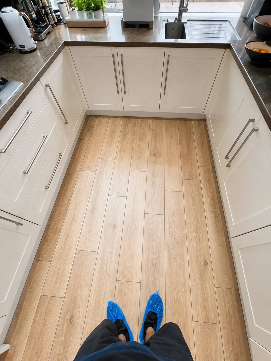 A kitchen floor left clean after a deep clean