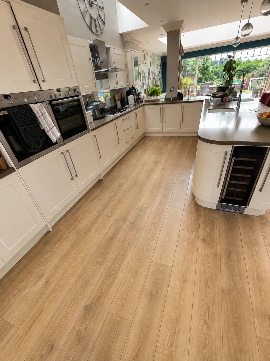 An open-plan kitchen floor finished after a full clean